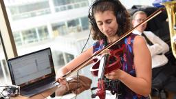 Musician playing electric violin